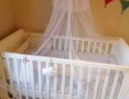 Mosquito net with wooden base for crib