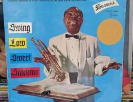 Louis Armstrong - Swing low sweet satchmo ...