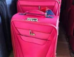 bright pink travel bags luggage in all siz...