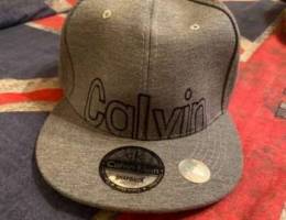 Calvin Klein Grey Cap .. New Condition .. ...