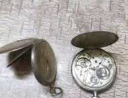 two manual winding silver watches