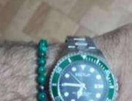 Sector with green malachite bracelet