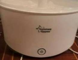 A new sterilizing machine for baby milk bo...