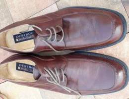 Man shoes 100,000