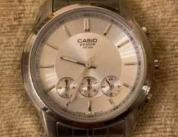 Casio beside watch