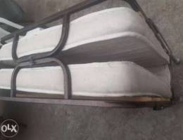 Foldable bed with mattress