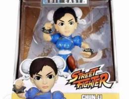 Chun-Li (Street Fighter) diecast figure.