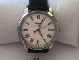 Tissot with brown leather bracelet