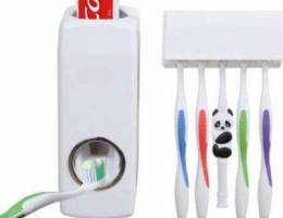 Toothbrush and toothpaste dispenser set