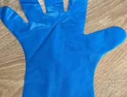 Plastic examination gloves