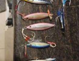 Jigging lures with hooks