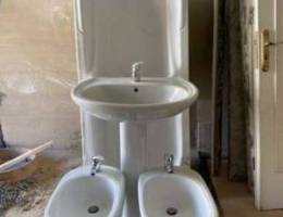 bathtub, sink with mixer, 2 bidets with mi...