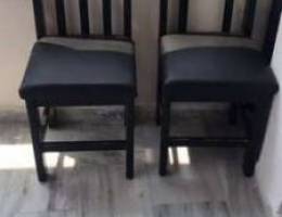 two black leather chairs