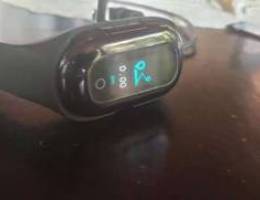 Smart watch with earbuds