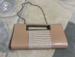 Beige bag clutch