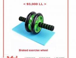 Braked exercise wheel