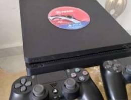 ps4 slim 2 controllers like new and fifa 2...