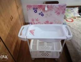 Baby seat for showering and changing cloth...