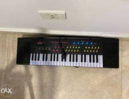 piano on batteries and electrical cord