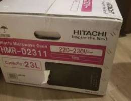 -microwave hitachi 23 liter ,new, unused,