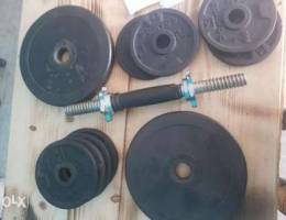 Iron & rubber plates + dumbbell axe