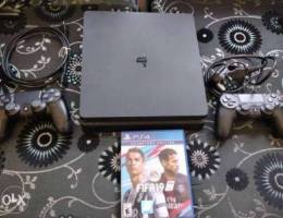 ps4 slim 1000gb like new 2 controllers and...